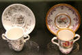 Porcelain chocolate cups with double handles & trembleuse saucers by Du Paquier of Vienna, Austria at Gardiner Museum. Toronto, ON.