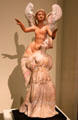 Terracotta group of ephedrismos: young woman with Eros on her shoulder possibly from Taranto, Italy at Montreal Museum of Fine Arts. Montreal, QC.