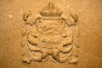 Provincial coat of arms carved on fireplace in Saskatchewan Legislative Library. Regina, SK.