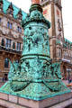 Base of flagpole with sailing ship on top at Hamburg City Hall plaza. Hamburg, Germany.