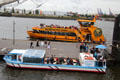 Day tour boats Altenwerder ferry & Iris Abicht tour boat on Elbe River. Hamburg, Germany.