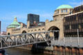 Domed heritage stone buildings at St Pauli Pier. Hamburg, Germany.