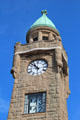 Stone clock tower at St Pauli Pier. Hamburg, Germany.