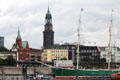 Swedish Gustav Adolf Church with tower of St Michael's church over Rickmer Rickmers museum ship. Hamburg, Germany.