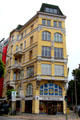 Yellow building at foot of Ditmar-Koel-Straße. Hamburg, Germany.