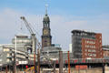 Round tower structure of Hamburg New City beside St Michael's church. Hamburg, Germany.
