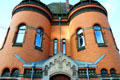 Entrance to Harbor Police Station building with coat-of-arms of Hamburg in HafenCity district. Hamburg, Germany.