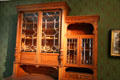 Sideboard with paned glass doors on cupboards from Viennese furniture factory at Hamburg History Museum. Hamburg, Germany.