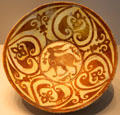 Earthenware dish painted with hare & palm fronds from Cairo, Egypt at Pergamon Museum. Berlin, Germany.