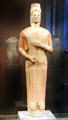 Attican, Greek marble funerary statue of woman in red dress at Altes Museum. Berlin, Germany.