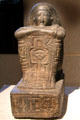 Egyptian stone statue of priest Sen-nefer at Neues Museum. Berlin, Germany.