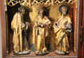 Detail of three Apostles on wing of Mass of St Gregory altarpiece at Aachen Cathedral Treasury. Aachen, Germany.