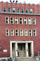House of Unions with socialist realist sculptures. Stralsund, Germany