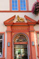 Ornate door surround for Lion Pharmacy , family business since 1660 & reputed to be oldest pharmacy in Germany on Hauptmarkt. Trier, Germany.