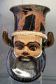 Greek terracotta red-figure drinking vessel in form of head of Satyr at Antikensammlungen. Munich, Germany.