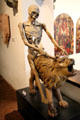 Death riding a lion sculpture once part of a clock from Kloster Heilsbronn at Bavarian National Museum. Munich, Germany.