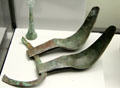 Roman stirgiles for scraping sweat off skin plus glass bottle for balms found near Augsburg at Bavarian State Archaeological Collection. Munich, Germany.