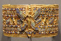 Armband with standing goddess of gold & glass at Museum Ägyptischer Kunst. Munich, Germany