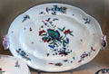 Meissen porcelain serving dishes painted with butterflies in green shades at Meissen porcelain museum at Lustheim Palace. Munich, Germany.