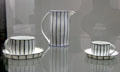Porcelain cups & saucers plus pitcher by Josef Hoffmann for Vienna Porcelain Manuf. at Pinakothek der Moderne. Munich, Germany.
