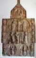Crucifixion above donors dressed as Medieval knights metal relief surrounded by coats of arms at Maximilian Museum. Augsburg, Germany.