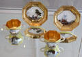 Meissen porcelain chocolate cups with gold decor at Bamberg Old Town Hall Museum of Faience & Porcelain. Bamberg, Germany.