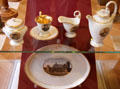 Porcelain coffee set celebrating 300 anniversary of Reformation painted with portraits of Martin Luther by KPM Berlin at Coburg Castle. Coburg, Germany.