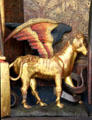 Winged bull symbol of Evangelist Luke detail of Life of Madonna altarpiece from Western Franconia at Germanisches Nationalmuseum. Nuremberg, Germany.