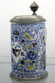 Blue-painted ceramic beer stein by Nicolaus Pössinger from Nuremberg at Fembohaus City Museum. Nuremberg, Germany.