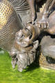 Couple strangling each other detail on Marriage Carousel sculpture. Nuremberg, Germany.