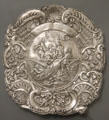 Silver plate embossed with scene of Christ directing disciples where to cast net engraved with names of local fishermen at Ulmer Museum. Ulm, Germany.