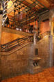 Stairway running up side of central hall at Palau Güell. Barcelona, Spain.