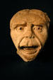 Sculpted gargoyle mask saved from Cathedral ruins in Tau Palace Museum. Reims, France