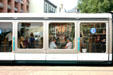 Passengers in modern streetcar. Strasbourg, France.