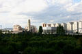 Cemetery of Neuilly with Courbevoie residential suburbs beyond seen from La Défense. Paris, France.