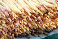 Stack of asparagus in food stall. Paris, France
