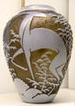 Glass vase with hind design by Daum at Museum of Decorative Arts. Paris, France.