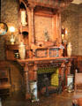 Carved oak & tile fireplace by cabinetmaker Fulgraff of Paris at Museum of Decorative Arts. Paris, France.