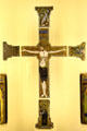 Enameled plaques of cross with Christ & Evangelist symbols from Limoges at Cluny Museum. Paris, France.