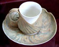 Sèvres porcelain fennel cup & saucer by Léon Kann at Sèvres National Ceramic Museum. Paris, France.