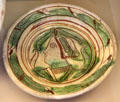 Glazed earthenware bowl with line-drawn facial profile of woman from Beauvaisis at Sèvres National Ceramic Museum. Paris, France.