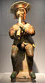 Glazed earthenware figure of chalémie flute player from Beauvaisis at Sèvres National Ceramic Museum. Paris, France.