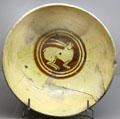 Ceramic bowl painted with rabbit from Constantinople at Sèvres National Ceramic Museum. Paris, France.