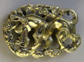 Mongolian bronze belt buckle showing horse fighting beast from Hungary at Cernuschi Museum. Paris, France