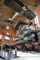 Breguet biplane over racks of French technology at Arts et Metiers Museum. Paris, France.