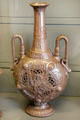 Bronze ornamented flat carafe by Ziegler of Voisinlieu at Arts et Metiers Museum. Paris, France.