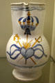 Earthenware pitcher painted with the ardent heart made by Faïence de Never at Carnavalet Museum. Paris, France.