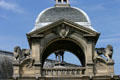 Open tower with statues of lions at Château de Chantilly. Chantilly, France.