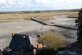 Bridge from main land to Mont-St-Michel islet. Mont-St-Michel, France.