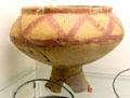 Gallic ceramic vase with tripod feet & geometric painting found in tomb of Eterville, Calvados at Museum of Normandy. Caen, France.